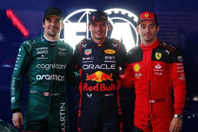 Memenuhi kualifikasi tiga besar parc ferme Lance Stroll (CDN) Aston Martin F1 Team AMR23, ketiga; Max Verstappen (NLD) Red Bull