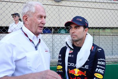 (L to R): Dr Helmut Marko (AUT) Red Bull Motorsport Consultant and Sergio Perez (MEX) Red Bull Racing on the grid. Formula
