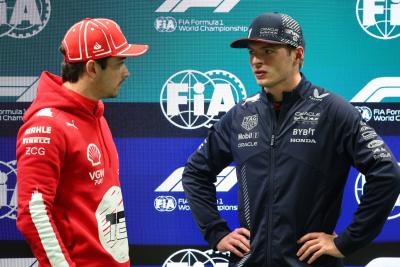 (L to R): Pole sitter Charles Leclerc (MON) Ferrari in qualifying parc ferme with third placed Max Verstappen (NLD) Red Bull