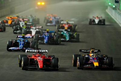 Charles Leclerc (MON) Ferrari SF-23 and Max Verstappen (NLD) Red Bull Racing RB19 at the start of the race. Formula 1