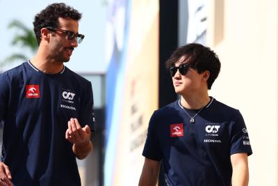(L to R): Daniel Ricciardo (AUS) AlphaTauri with Yuki Tsunoda (JPN) AlphaTauri. Formula 1 World Championship, Rd 23, Abu