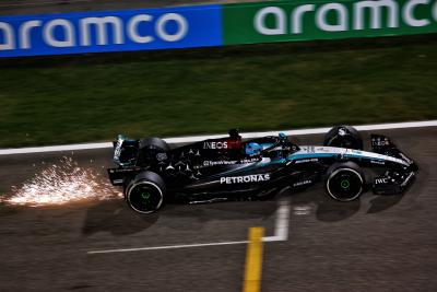 George Russell (GBR) Mercedes AMG F1 W15 sends sparks flying. Formula 1 Testing, Sakhir, Bahrain, Day One. -