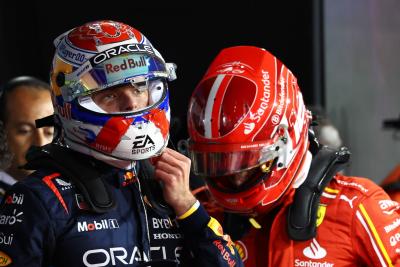 Pole sitter Max Verstappen (NLD) Red Bull Racing with Charles Leclerc (MON) Ferrari in qualifying parc ferme. Formula 1