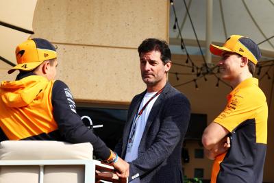 (L to R): Lando Norris (GBR) McLaren with Mark Webber (AUS) Channel 4 Presenter / Driver Manager and Oscar Piastri (AUS)