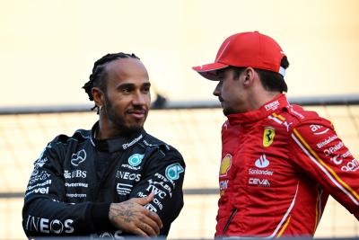 (L to R): Lewis Hamilton (GBR) Mercedes AMG F1 with Charles Leclerc (MON) Ferrari on the drivers' parade. Formula 1 World
