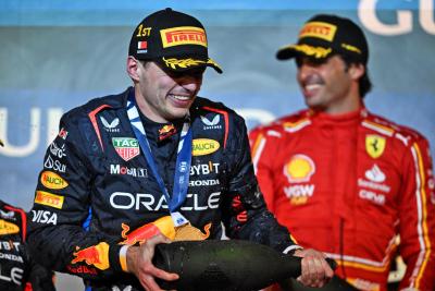 Race winner Max Verstappen (NLD) Red Bull Racing celebrates on the podium. Formula 1 World Championship, Rd 1, Bahrain