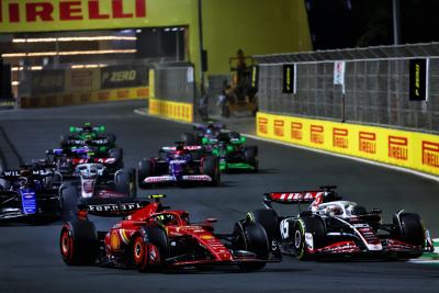 Oliver Bearman (GBR) Ferrari SF-24 Reserve Driver and Kevin Magnussen (DEN) Haas VF-24 at the start of the race. Formula 1