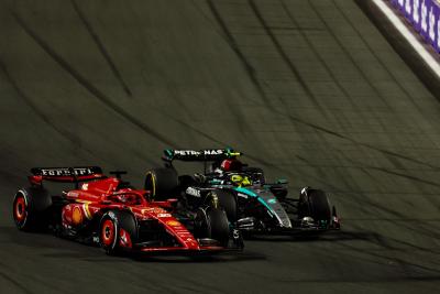 Charles Leclerc (MON) Ferrari SF-24 and Lewis Hamilton (GBR) Mercedes AMG F1 W15 battle for position. Formula 1 World