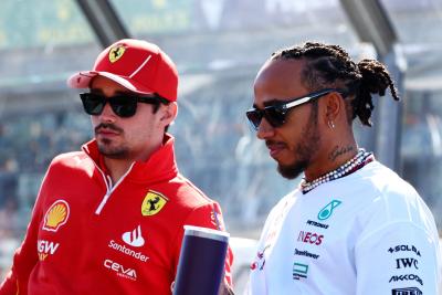 (L to R): Charles Leclerc (MON) Ferrari and Lewis Hamilton (GBR) Mercedes AMG F1 on the drivers' parade. Formula 1 World