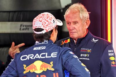 Sergio Perez (MEX) Red Bull Racing with Dr Helmut Marko (AUT) Red Bull Motorsport Consultant. Formula 1 World