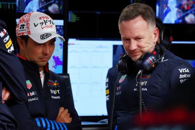 (L to R): Sergio Perez (MEX) Red Bull Racing with Christian Horner (GBR) Red Bull Racing Team Principal. Formula 1 World