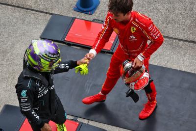 Lewis Hamilton (GBR) Mercedes AMG F1 and Charles Leclerc (MON) Ferrari in qualifying parc ferme. Formula 1 World