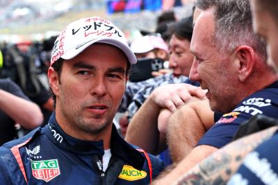 Second placed Sergio Perez (MEX) Red Bull Racing with Christian Horner (GBR) Red Bull Racing Team Principal in parc ferme.