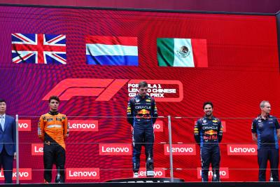 The podium (L to R): Lando Norris (GBR) McLaren, second; Max Verstappen (NLD) Red Bull Racing, race winner; Sergio Perez