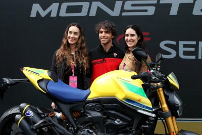 Bianca Senna (BRA) Senna Brands CEO (Left) and Enea Bastianini (ITA) Ducati Moto GP Rider (Centre) - Ducati Monster Senna