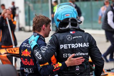 George Russell (GBR) Mercedes AMG F1 (Right) celebrates his pole position in qualifying parc ferme with second placed Max