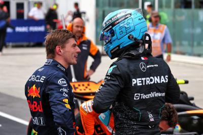 George Russell (GBR) Mercedes AMG F1 (Right) celebrates his pole position in qualifying parc ferme with second placed Max