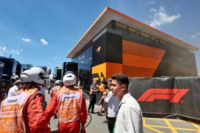 A fire in the McLaren motorhome is tended to by fire fighters. Formula 1 World Championship, Rd 10, Spanish Grand Prix,