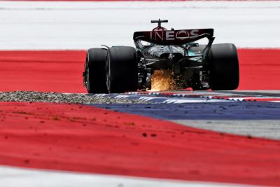 George Russell (GBR) Mercedes AMG F1 W15 sends sparks flying. Formula 1 World Championship, Rd 11, Austrian Grand Prix,