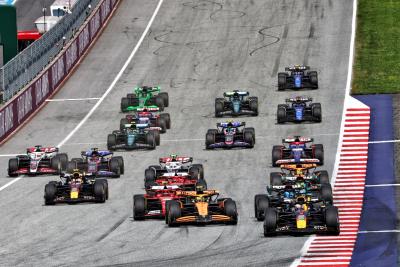 Max Verstappen (NLD) Red Bull Racing RB20 leads at the start of the race. Formula 1 World Championship, Rd 11, Austrian