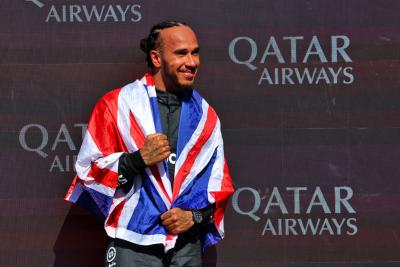 Race winner Lewis Hamilton (GBR) Mercedes AMG F1 celebrates on the podium. Formula 1 World Championship, Rd 12, British