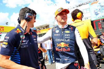 (L to R): Jo Canales, Red Bull Racing Personal Trainer with Max Verstappen (NLD) Red Bull Racing on the grid. Formula 1