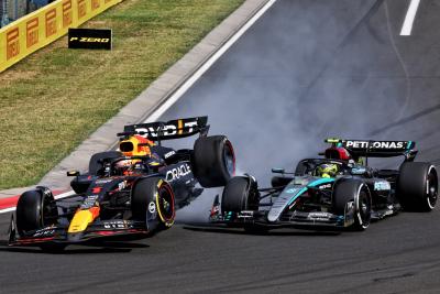 Lewis Hamilton (GBR) Mercedes AMG F1 W15 and Lewis Hamilton (GBR) Mercedes AMG F1 W15 collide. Formula 1 World