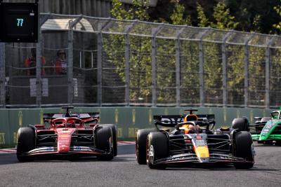 Max Verstappen (NLD) Red Bull Racing RB20 and Charles Leclerc (MON) Ferrari SF-24 battle for position. Formula 1 World