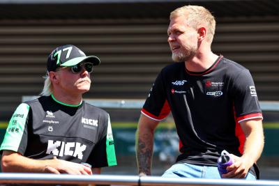 (L to R): Valtteri Bottas (FIN) Sauber with Kevin Magnussen (DEN) Haas F1 Team on the drivers' parade. Formula 1 World