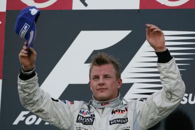 McLaren`s Kimi Raikkonen celebrates his win at Suzuka