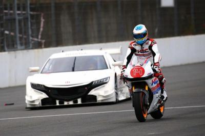 Fernando Alonso rides MotoGP Honda