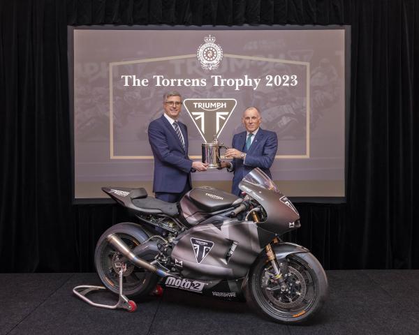 Nick Bloor, CEO Triumph Motorcycles being presented with Royal Automobile Club Torrens Trophy by Ben Cussons, Chairman of the Royal Automobile Club
