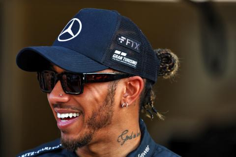 Lewis Hamilton (GBR) Mercedes AMG F1 at a team photograph - the bankrupt FTX branding still showing on his cap. Formula 1