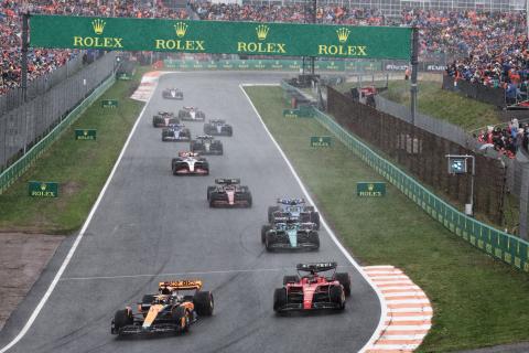 (L to R): Oscar Piastri (AUS) McLaren MCL60 and Charles Leclerc (MON) Ferrari SF-23 battle for position at the start of the