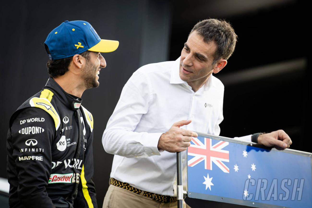 Mclaren driver Daniel Ricciardo of Australia shows a tattoo on his