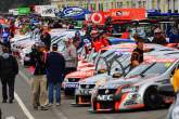 Garth Tander (aust) Toll HRT Commodore climb into his car on the pre grid in pit laneV8 Supercars Rd