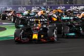 Lewis Hamilton and Max Verstappen battling at first restart