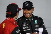 Lewis Hamilton (GBR), Mercedes AMG F1 en Carlos Sainz Jr (ESP), Scuderia Ferrari 
