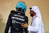 (L to R): George Russell (GBR) Mercedes AMG F1 with Mohammed Bin Sulayem (UAE) FIA President in qualifying parc ferme.
