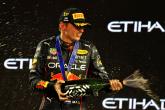 Race winner Max Verstappen (NLD) Red Bull Racing celebrates on the podium. Formula 1 World Championship, Rd 22, Abu Dhabi