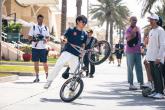 Yuki Tsunoda (JPN) AlphaTauri on a BMX bike. Formula 1 World Championship, Rd 1, Bahrain Grand Prix, Sakhir, Bahrain,