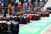 Sergio Perez (MEX) Red Bull Racing RB19 leaves the pits. Formula 1 World Championship, Rd 10, Austrian Grand Prix,