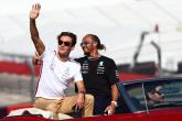 (L to R): George Russell (GBR) Mercedes AMG F1 and Lewis Hamilton (GBR) Mercedes AMG F1 on the drivers' parade. Formula 1