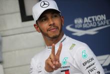 Hamilton storms to wet-weather pole in Hungary