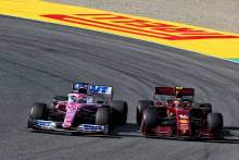 Sergio Perez (MEX) Racing Point F1 Team RP19 and Charles Leclerc (MON) Ferrari SF1000 battle for position.