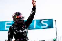 Lewis Hamilton (GBR) Mercedes AMG F1 celebrates his pole position in qualifying parc ferme.