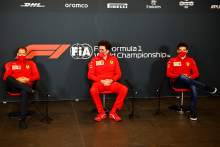 (L to R): Sebastian Vettel (GER) Ferrari; Mattia Binotto (ITA) Ferrari Team Principal; and Charles Leclerc (MON) Ferrari, in the FIA Press Conference.