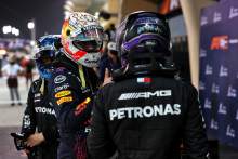 Max Verstappen (NLD) Red Bull Racing and Lewis Hamilton (GBR) Mercedes AMG F1 in qualifying parc ferme.