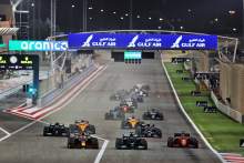 Max Verstappen (NLD) Red Bull Racing RB16B leads Lewis Hamilton (GBR) Mercedes AMG F1 W12 and Charles Leclerc (MON) Ferrari SF-21 at the start of the race.