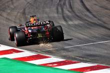 Max Verstappen (NLD) Red Bull Racing RB16B sends sparks flying.